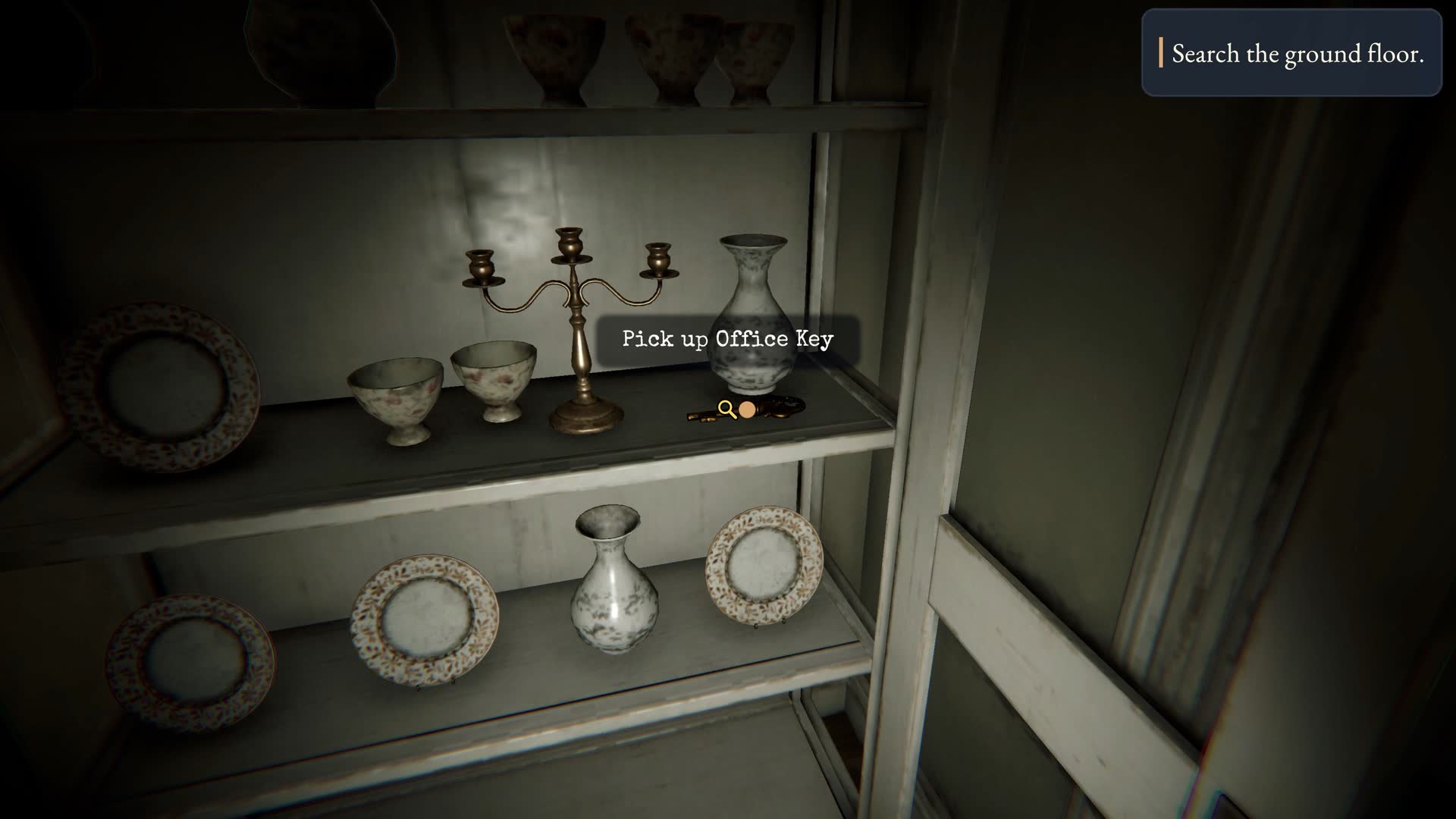 A shelf of crockery with an item prompt showing